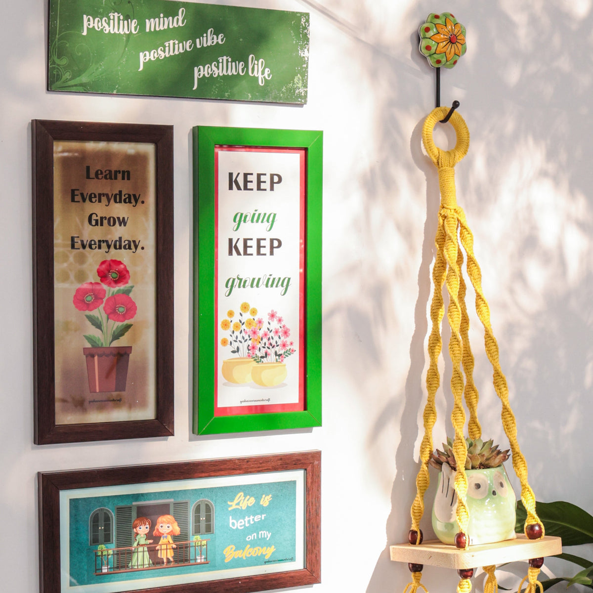 Life is better on the balcony wall combo | Yellow macrame shelf with frames